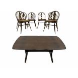 Ercol medium elm rectangular dining table and six hoop back chairs