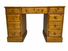 Polished pine twin pedestal desk