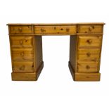 Polished pine twin pedestal desk