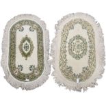 Two oval Indian woollen rugs