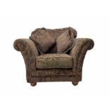 Armchair upholstered in plum fabric decorated with raised floral repeating pattern