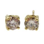 Pair of 18ct gold round brilliant cut diamond stud earrings