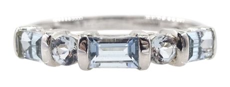 White gold blue and white topaz ring