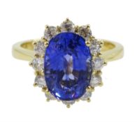 18ct gold fine Ceylon sapphire and diamond cluster ring