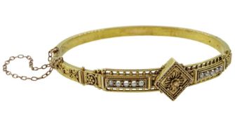 Victorian gold Etruscan Revival hinged bangle set with split pearls