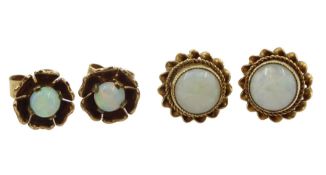 Pair of gold opal flower stud earrings and one other pair of circular opal stud earrings