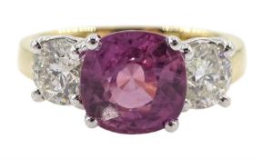 18ct gold three stone round pink sapphire and round brilliant cut diamond ring