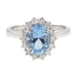 18ct white gold oval aquamarine and diamond cluster ring