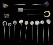Collection of fourteen Victorian and later silver and gilt stick pins including horseshoe