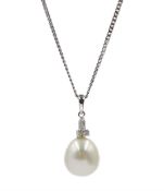 9ct white gold pearl and diamond pendant