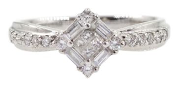 White gold baguette and round brilliant cut diamond dress ring stamped 18K 750