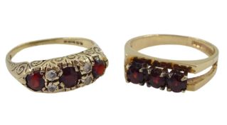 Gold three stone garnet ring and a gold garnet and cubic zirconia ring
