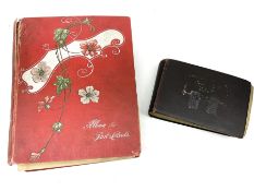 Early 20th century album containing over three-hundred and forty predominantly Edwardian postcards i