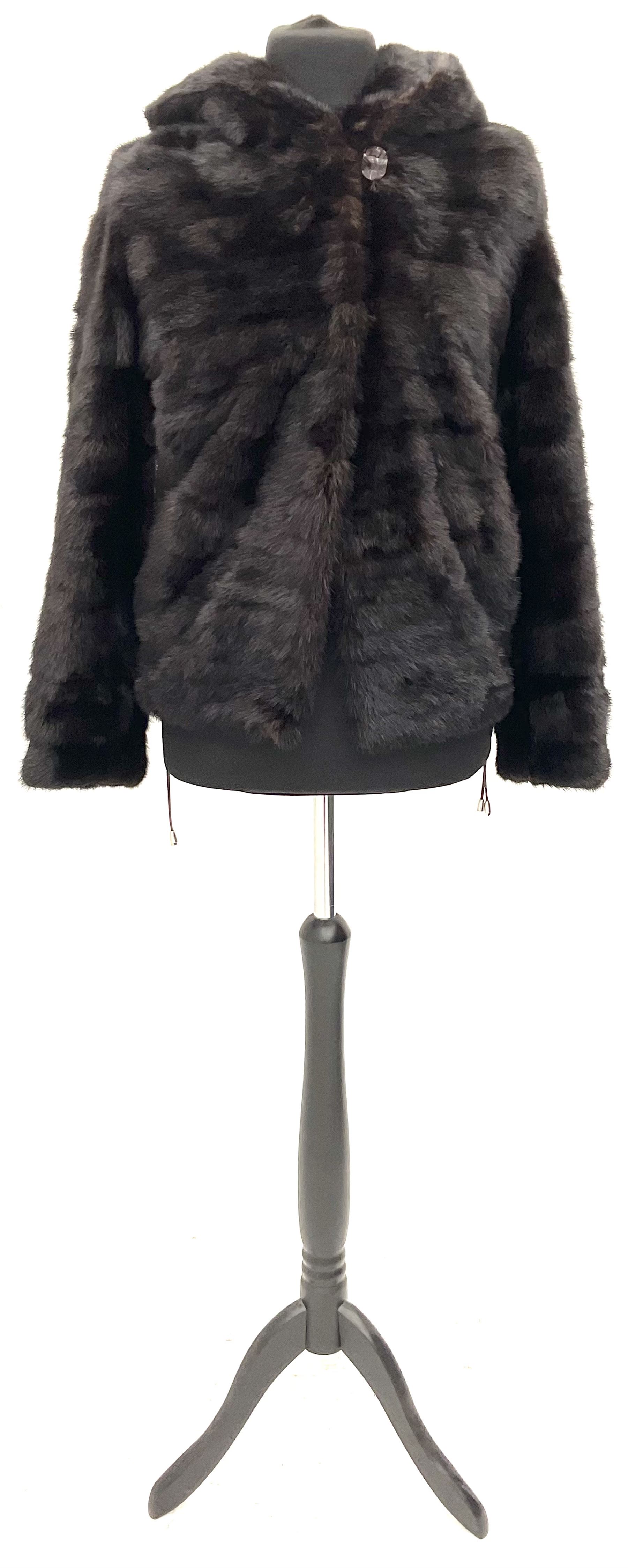 Modern cut lightweight nearly black mink jacket with integral hood