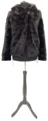 Modern cut lightweight nearly black mink jacket with integral hood