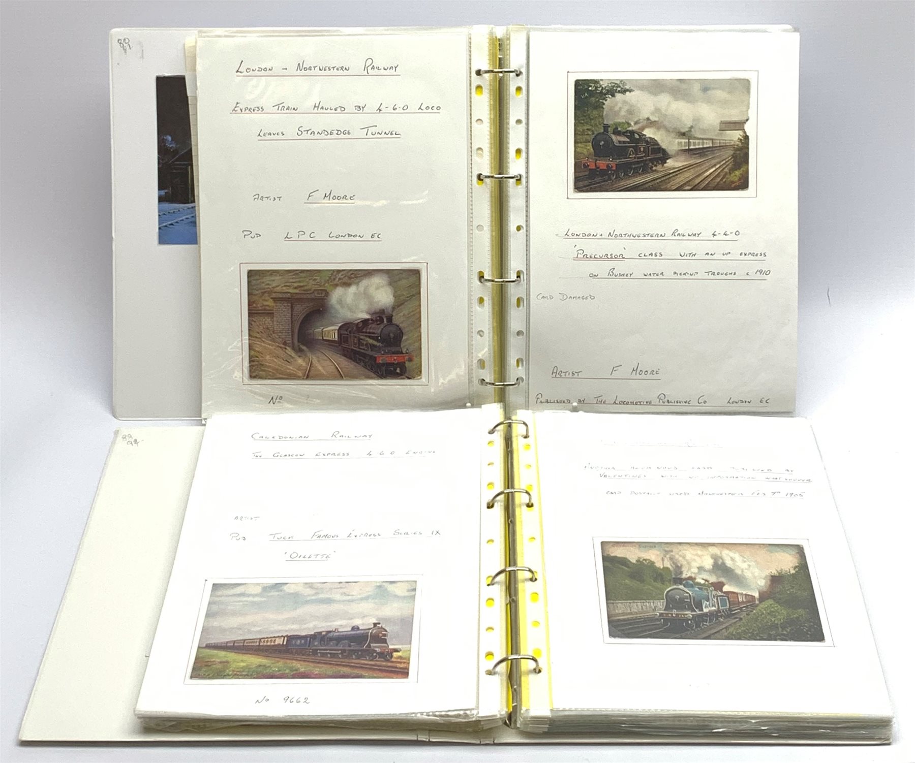 Two modern loose leaf albums containing over one-hundred and seventy printed postcards of railway i