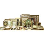 Large quantity of photo frames comprising mostly gilt examples of various aperture sizes and shapes