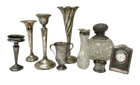 Group of silver to include wrythen twist vase with filled base