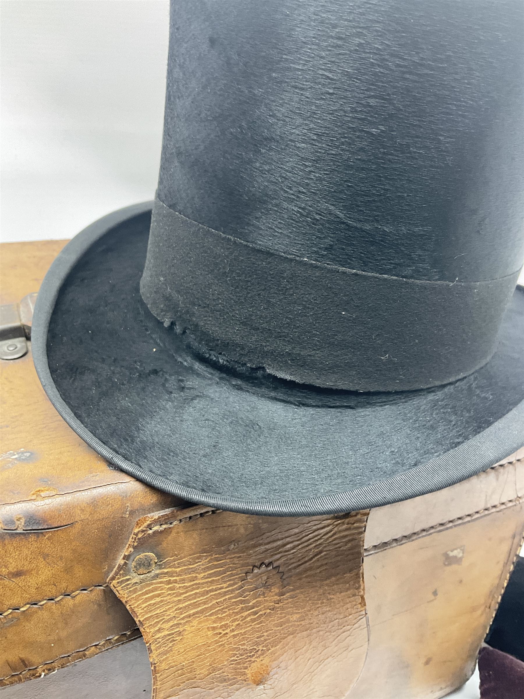 Gentlemen's black brushed silk top hat by Henry Heath of London housed in a leather case with dark r - Image 9 of 9