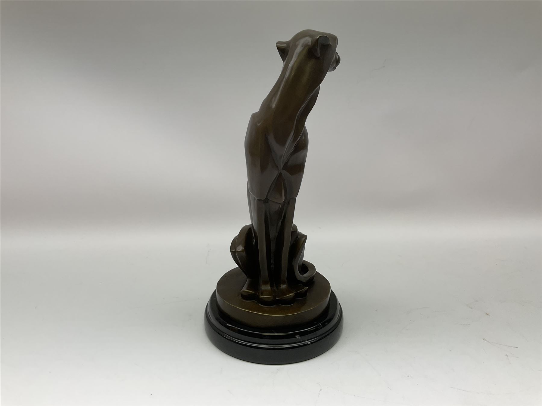 Stylised bronze figure of a seated cheetah after 'Milo' with foundry mark on circular base - Image 6 of 8