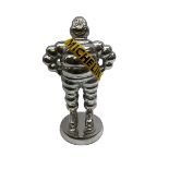 Polished aluminium Michelin man figure