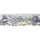 Blue and white Willow pattern ceramics to include dinner wares and tea wares such as lidded tureens