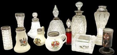 Group of silver mounted glass scent bottles and crested ware
