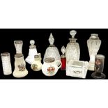 Group of silver mounted glass scent bottles and crested ware