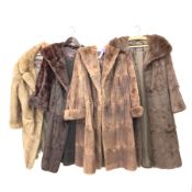 Four ladies three quarter length fur coats