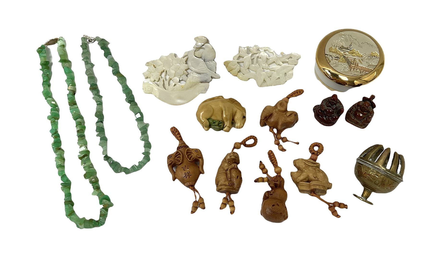 Japanese carved wood netsukes modelled as animals to include rabbit and bear with beaded strings