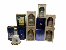 Eleven Bell's Old Scotch Whisky ceramic decanters including Christmas 1988