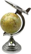 Art Deco style world globe with chrome aeroplane finial and mounts