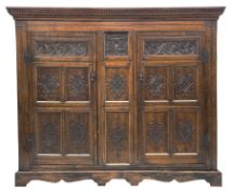 Large 18th century and later oak livery cupboard