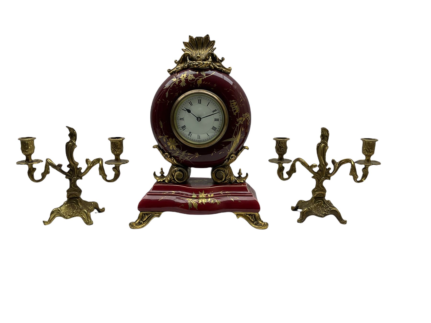 A 20th century three-piece clock garniture