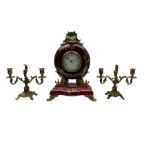 A 20th century three-piece clock garniture