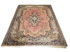 Large Persian design peach ground carpet