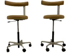 Two vintage chrome and leatherette dentist chairs