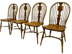 Set of four light elm stick back chairs