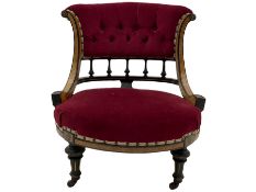 Victorian ebonised and amboyna nursing chair