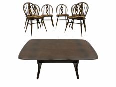 Ercol medium elm rectangular dining table and six hoop back chairs