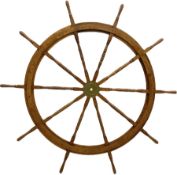 Very large 20th century walnut ship's wheel with ten turned spokes and brass central boss