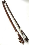 Seven violin bows/sticks