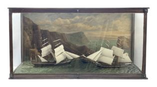 Large early 20th century diorama with three waterline sailing vessels at sea