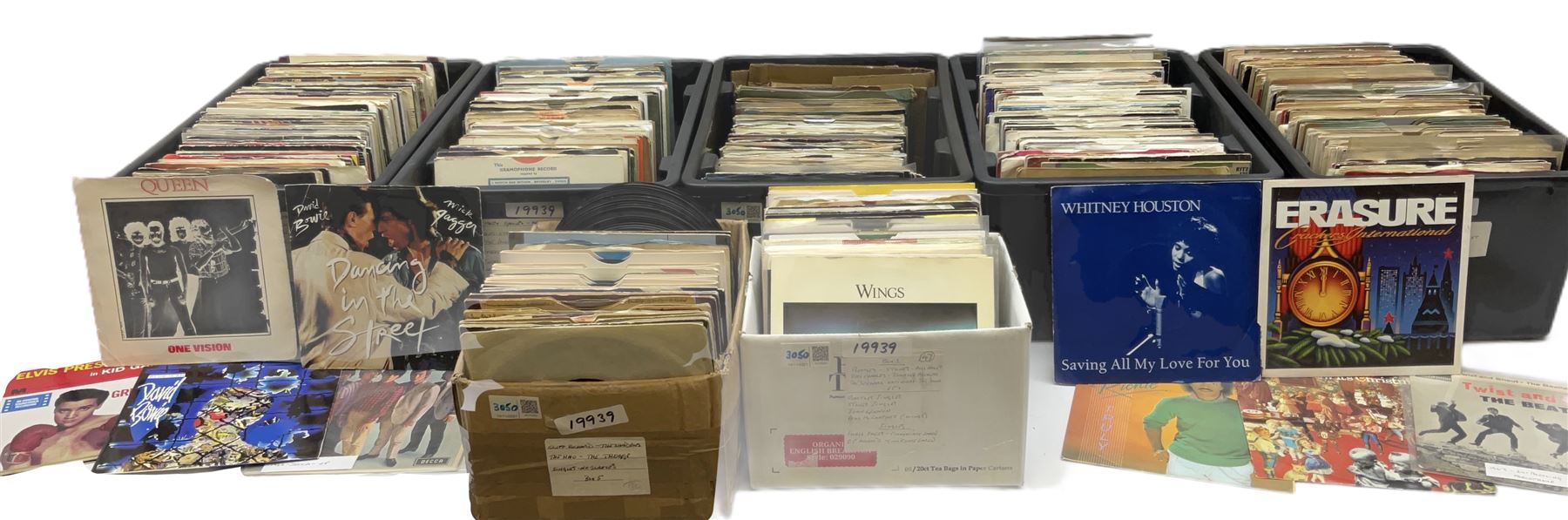 Seven boxes containing approximately eight hundred 45rpm singles