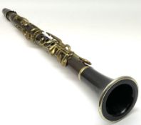 Early 20th century hardwood four-piece clarinet with brass plated nickel mounts L64cm