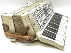 Italian Lambardi piano accordion in ivory coloured pearline case with jewelled decoration