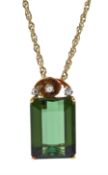 14ct gold emerald cut green tourmaline and three stone round brilliant cut diamond pendant