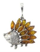Silver Baltic amber hedgehog pendant