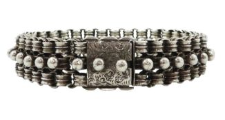 Victorian silver bracelet with bead and circular links and an engraved box clasp
