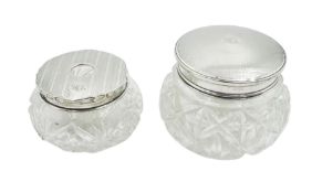Two George V silver mounted cut glass dressing table jars